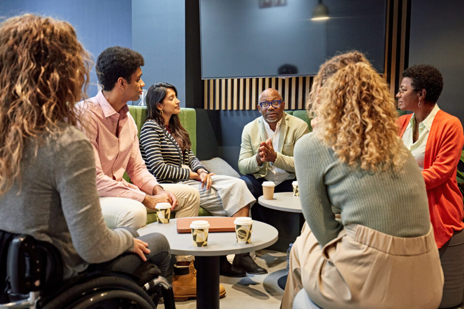 Feature image A group of coworkers has a meeting in office