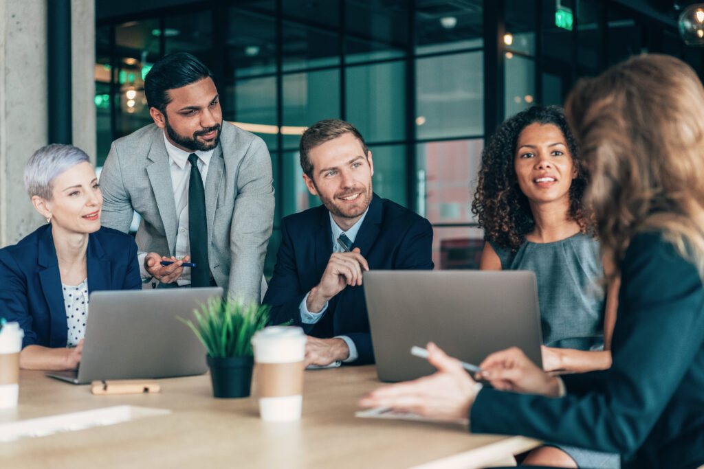 image shows an HR team talking about HR KPIs they want to start to track