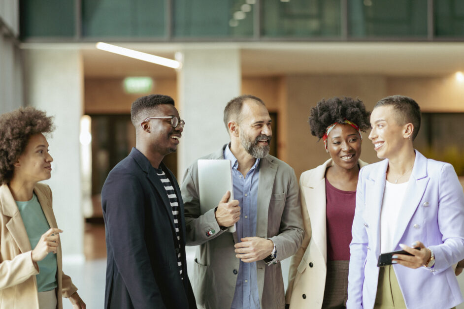 people in the workplace discussing the best software for employee issue management
