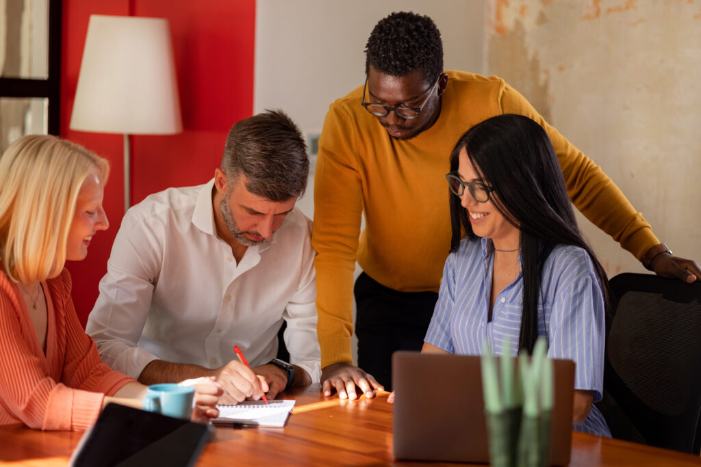 Employee relations team discussing the strategic role employee relations plays