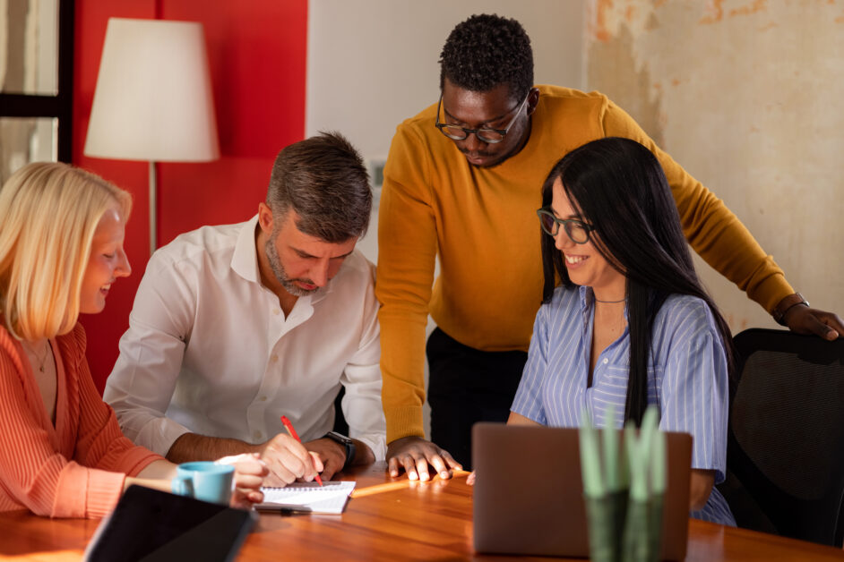 Employee relations team discussing the strategic role employee relations plays