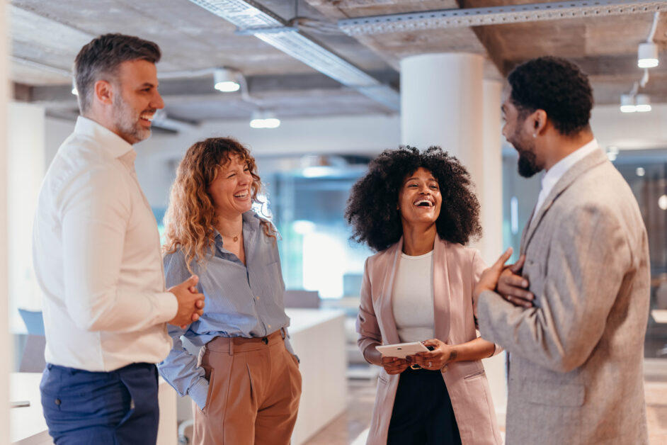 coworkers discussing enterprise risk management